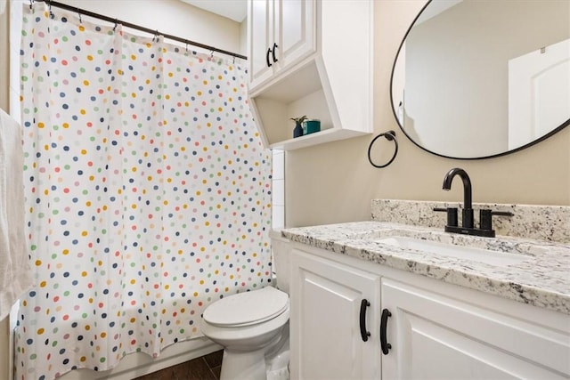 full bathroom featuring vanity, toilet, and shower / bath combo with shower curtain