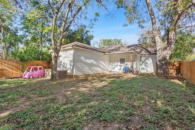 rear view of house with cooling unit