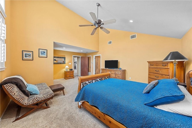 bedroom with multiple windows, light colored carpet, high vaulted ceiling, and ceiling fan