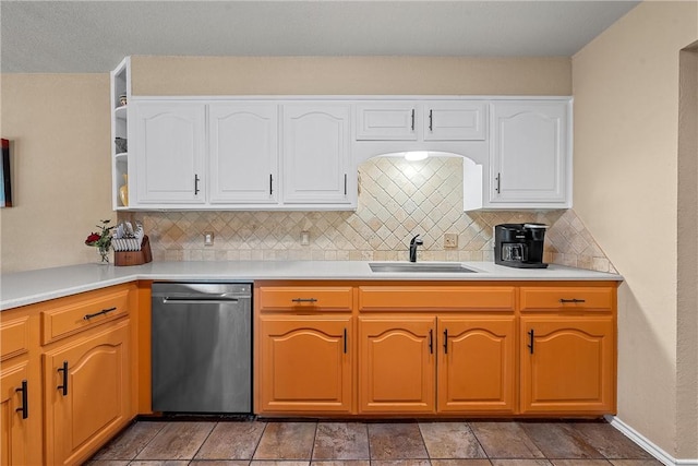 kitchen featuring tasteful backsplash and sink