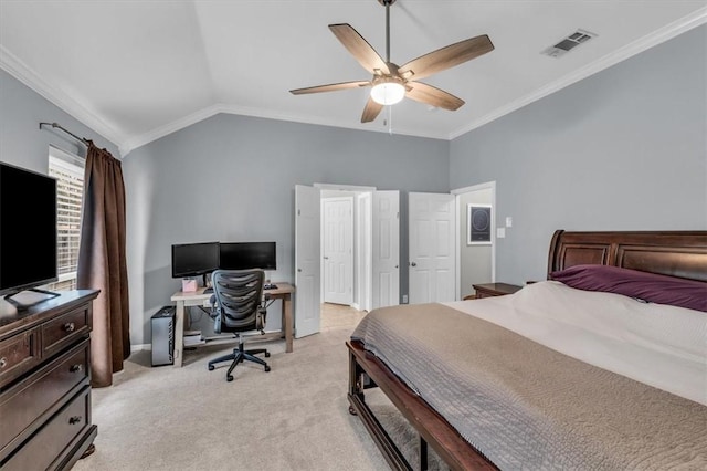 carpeted bedroom with vaulted ceiling, ceiling fan, and ornamental molding