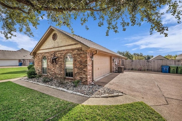 view of property exterior featuring a lawn, cooling unit, and a garage