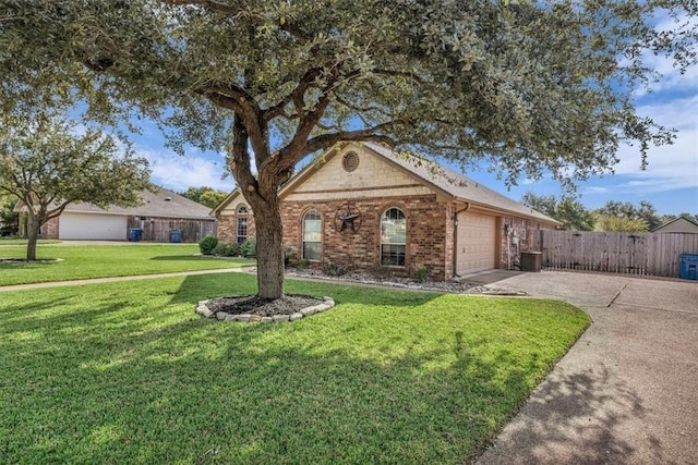 ranch-style house with a garage and a front lawn