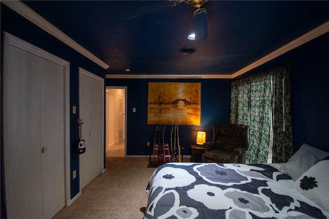 bedroom featuring visible vents, crown molding, and light colored carpet