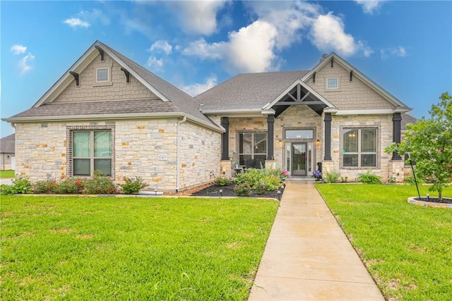 craftsman-style house with a front lawn