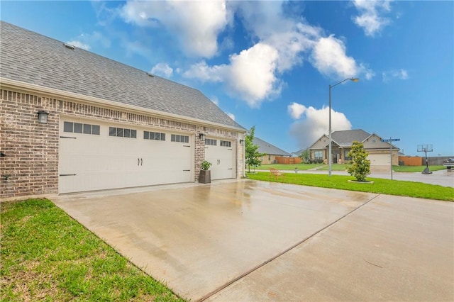 garage with a yard