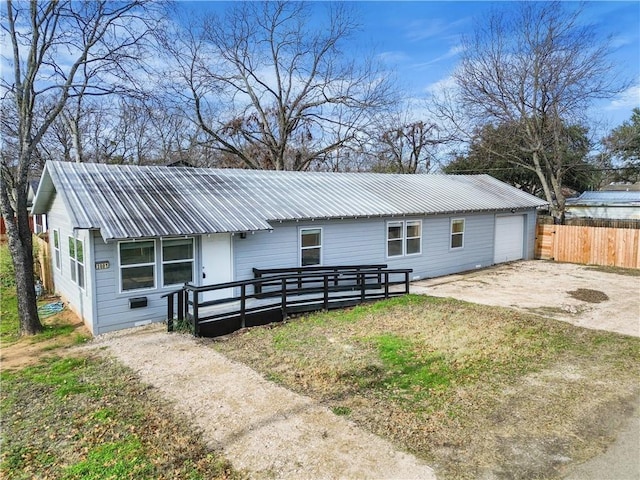 single story home with a garage