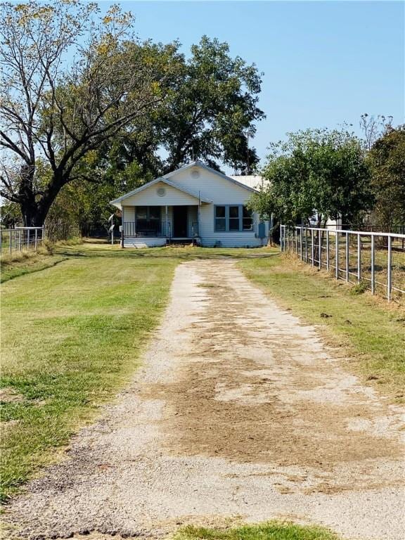 view of front of home with a front yard