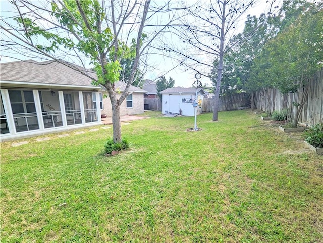 view of yard with a storage shed