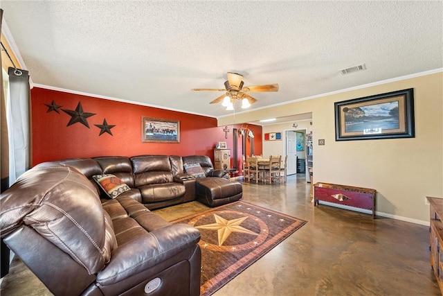 living room with ceiling fan, crown molding, and a textured ceiling