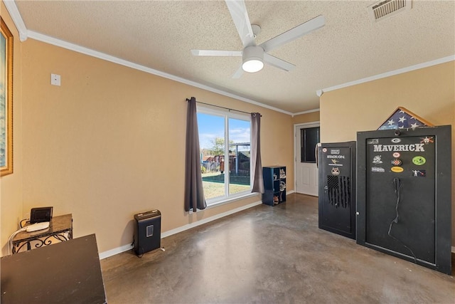 interior space featuring ceiling fan, ornamental molding, a textured ceiling, and concrete floors