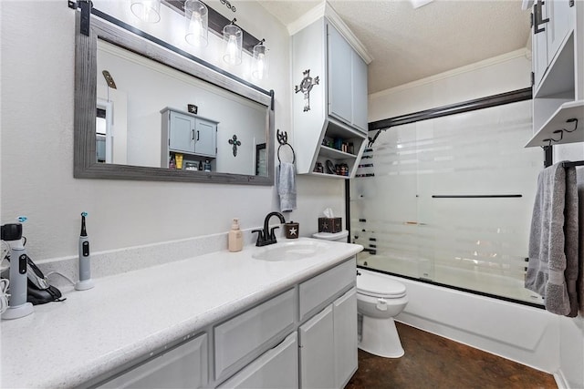 full bathroom with vanity, combined bath / shower with glass door, toilet, ornamental molding, and a textured ceiling