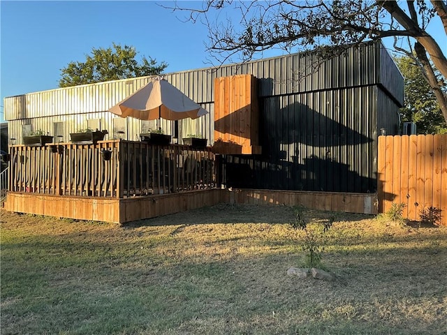 view of gate with a deck