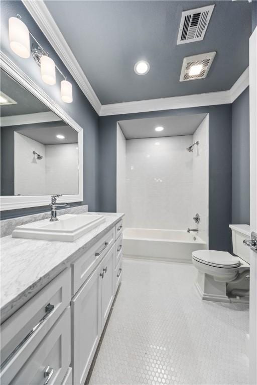 full bathroom with vanity, tiled shower / bath, tile patterned flooring, toilet, and ornamental molding