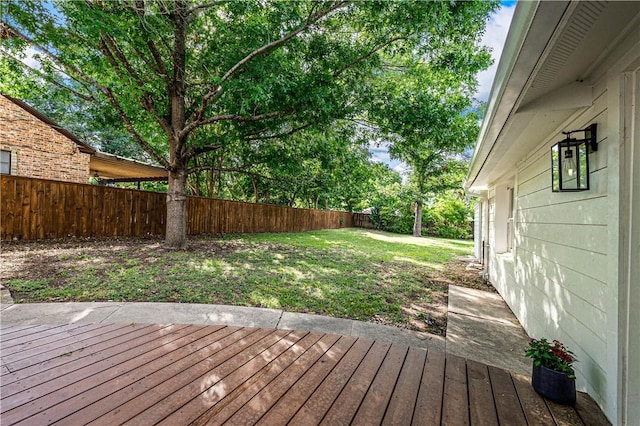 deck featuring a yard