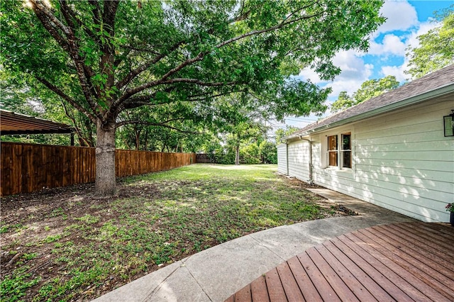 view of yard featuring a wooden deck