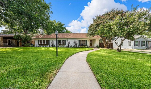 ranch-style house with a front yard