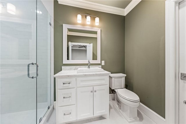 bathroom with vanity, tile patterned floors, toilet, ornamental molding, and a shower with shower door