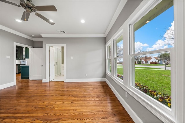 interior space with ceiling fan