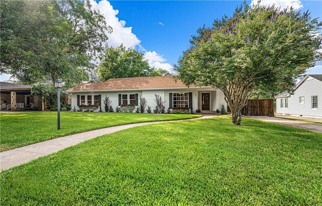 ranch-style house with a front yard