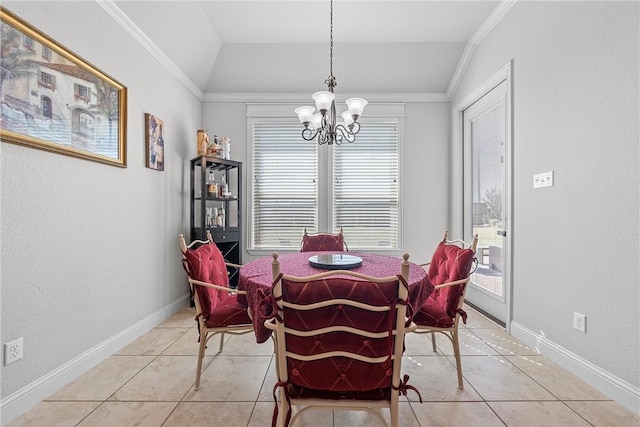 dining space with crown molding, a notable chandelier, lofted ceiling, and light tile patterned floors