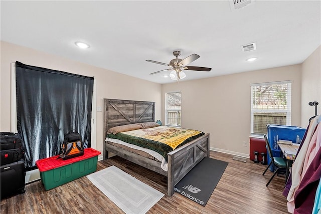 bedroom featuring ceiling fan and wood-type flooring