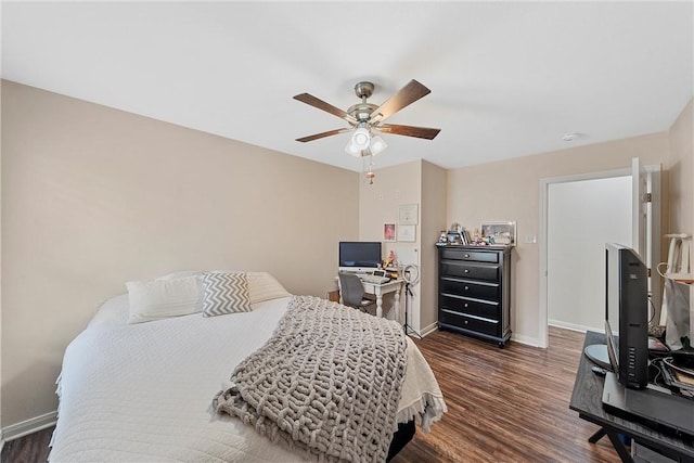 bedroom with ceiling fan and dark wood-type flooring