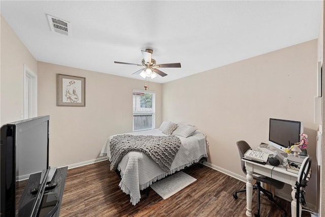 bedroom featuring ceiling fan and dark hardwood / wood-style flooring