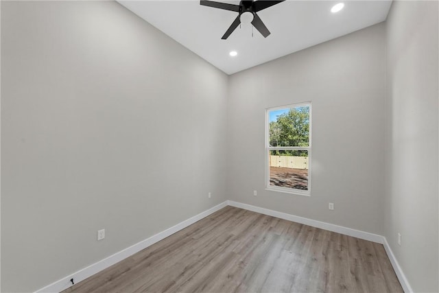 unfurnished room featuring ceiling fan and light hardwood / wood-style flooring