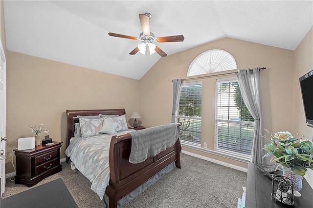 carpeted bedroom with vaulted ceiling and ceiling fan