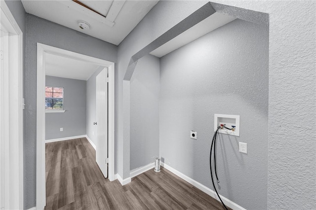 laundry room with washer hookup, hardwood / wood-style flooring, and electric dryer hookup