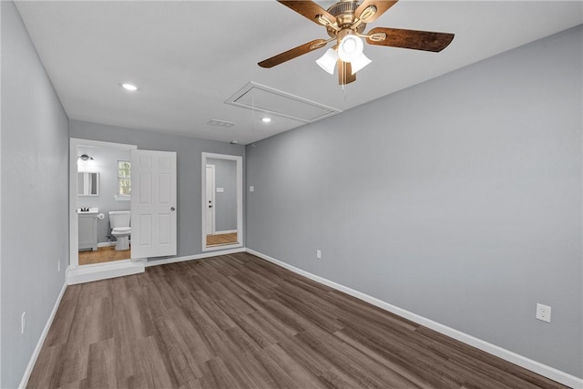 spare room featuring hardwood / wood-style flooring and ceiling fan