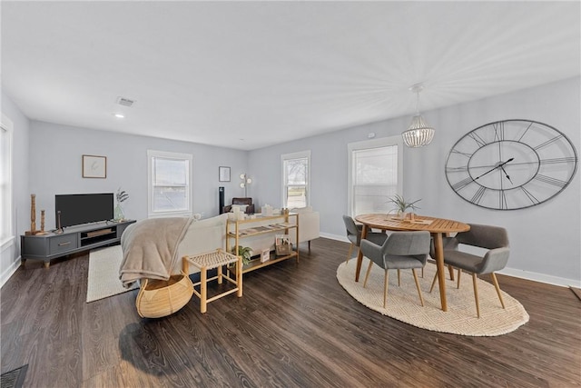 living room featuring dark hardwood / wood-style floors