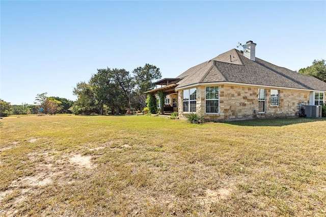 view of property exterior featuring a yard and cooling unit