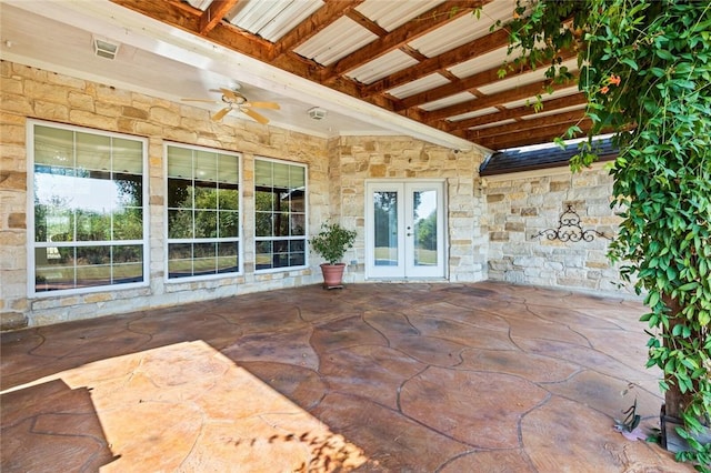 view of patio featuring ceiling fan and french doors