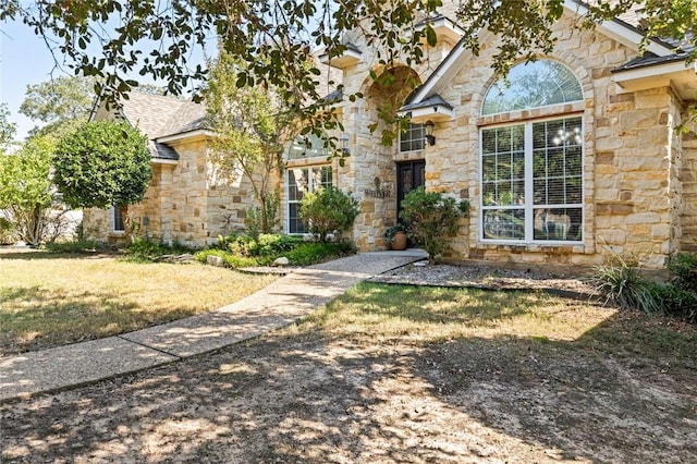 view of front of home with a front yard