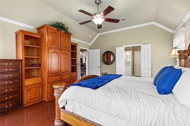 bedroom with hardwood / wood-style flooring, ceiling fan, crown molding, and vaulted ceiling