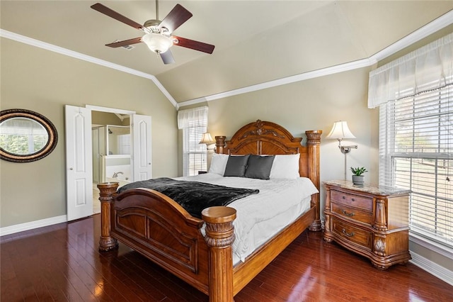 bedroom with ceiling fan, dark hardwood / wood-style flooring, ornamental molding, and vaulted ceiling