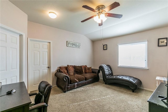 carpeted living room featuring vaulted ceiling and ceiling fan