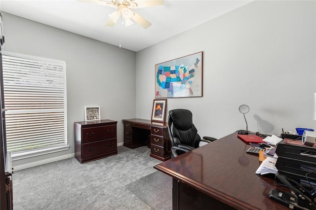 office with light colored carpet and ceiling fan