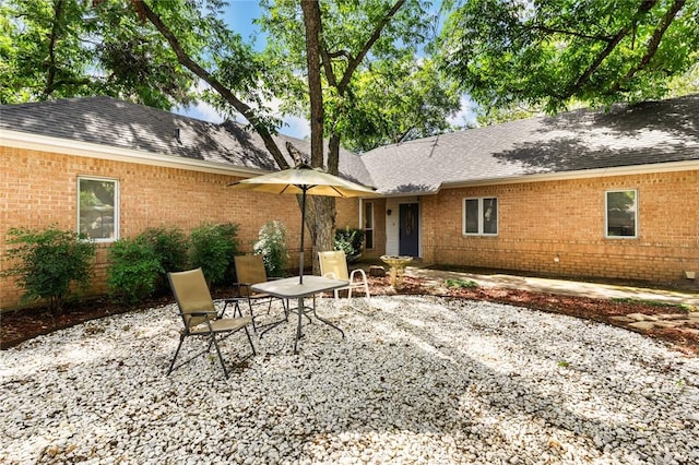 rear view of property with a patio area