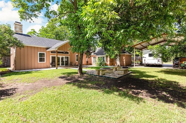 view of yard with french doors