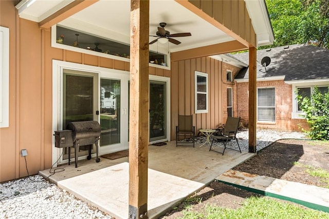 view of patio featuring ceiling fan