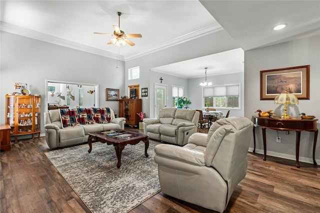 living room featuring crown molding, ceiling fan with notable chandelier, and dark hardwood / wood-style flooring