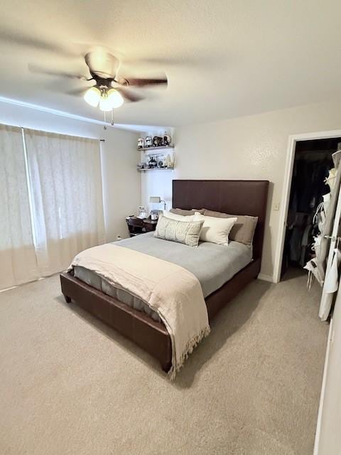 bedroom featuring carpet and ceiling fan