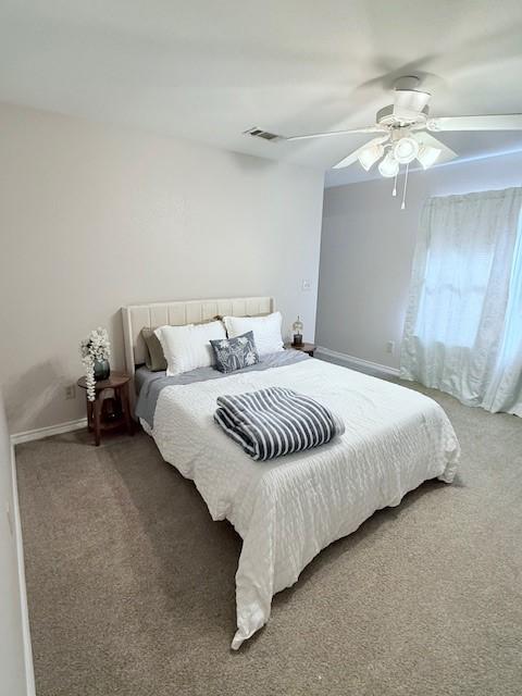 bedroom with carpet flooring and ceiling fan