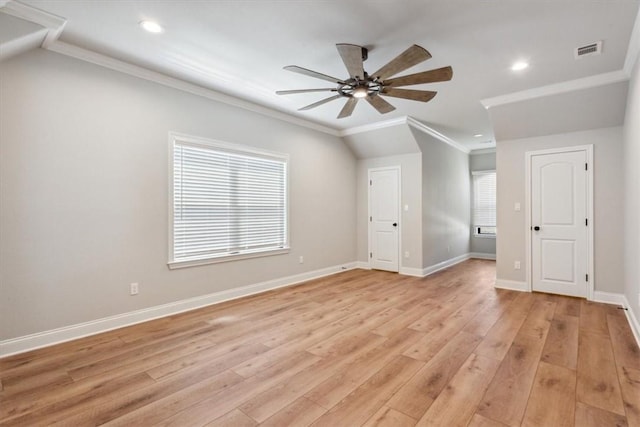 interior space featuring ceiling fan, lofted ceiling, and light wood-type flooring