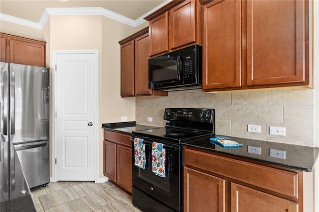 kitchen featuring crown molding, dark stone counters, decorative backsplash, and black appliances