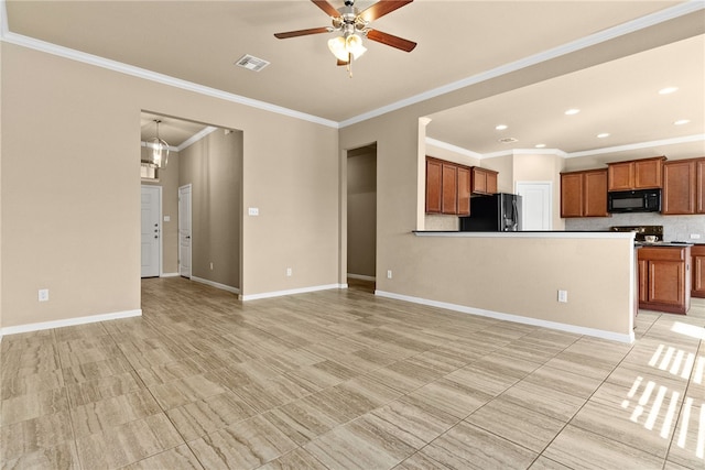 unfurnished living room featuring crown molding and ceiling fan with notable chandelier