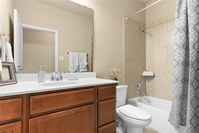 full bathroom featuring vanity, toilet, and shower / tub combo